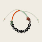 Perlenarmband Schulkind in mint/orange und schwarzen Schriftperlen