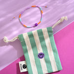 Perlenarmband smile lila/orange